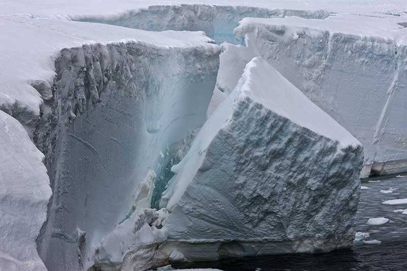 antarctic_ice-calving-off-ice-shelf_ian-phillips